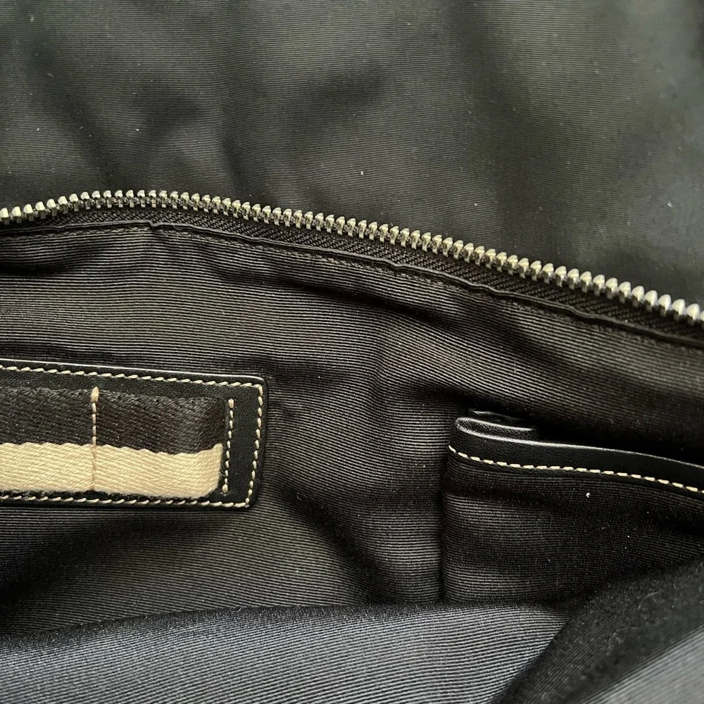 Vintage Coach black nylon leather trimmed flap messenger bag adjustable strap.